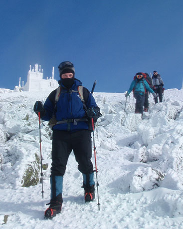 Sean Collier on Mt. Washington summit in the winter